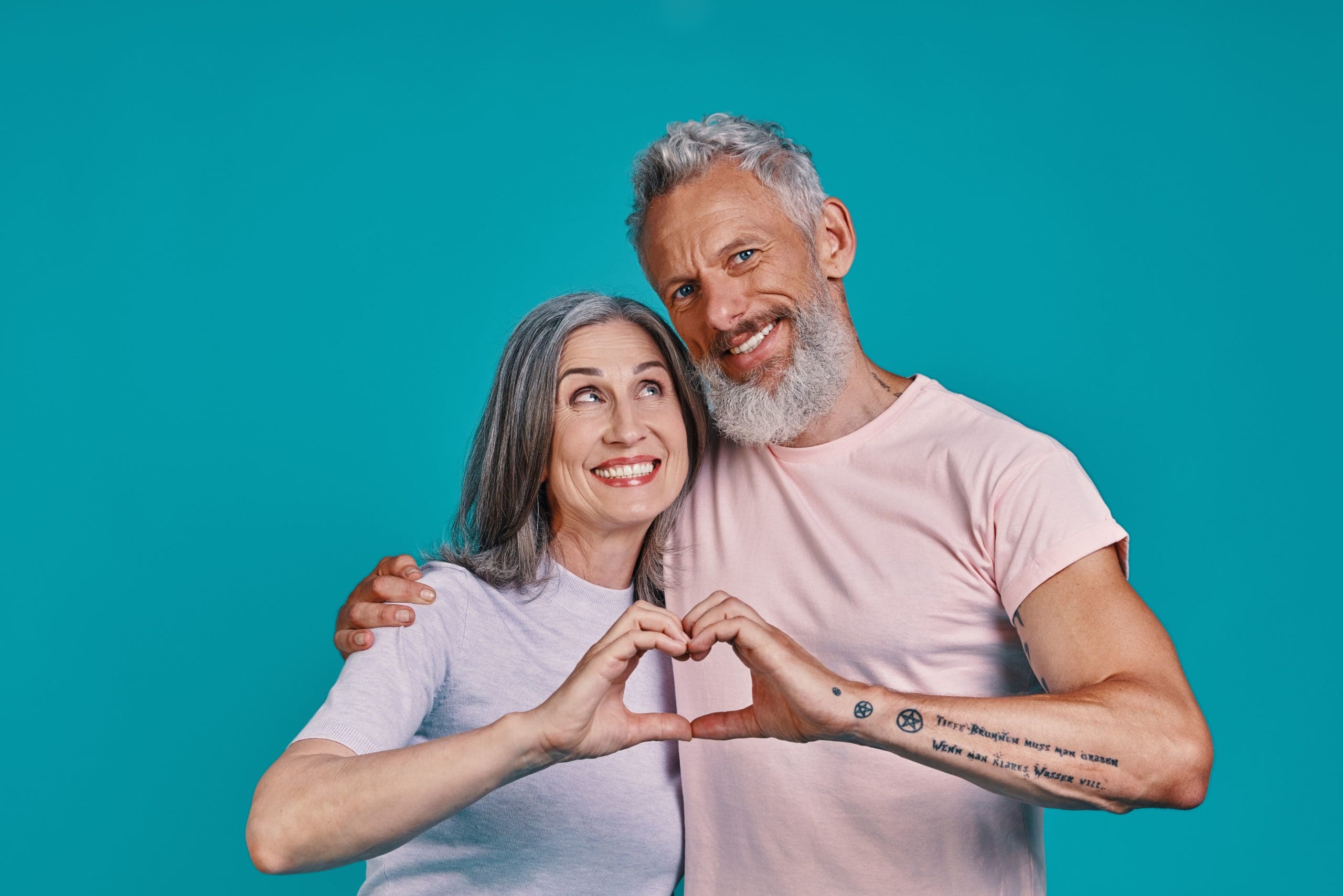 Dentures - Kensington Court Clinic - happy couple with dentures - header image