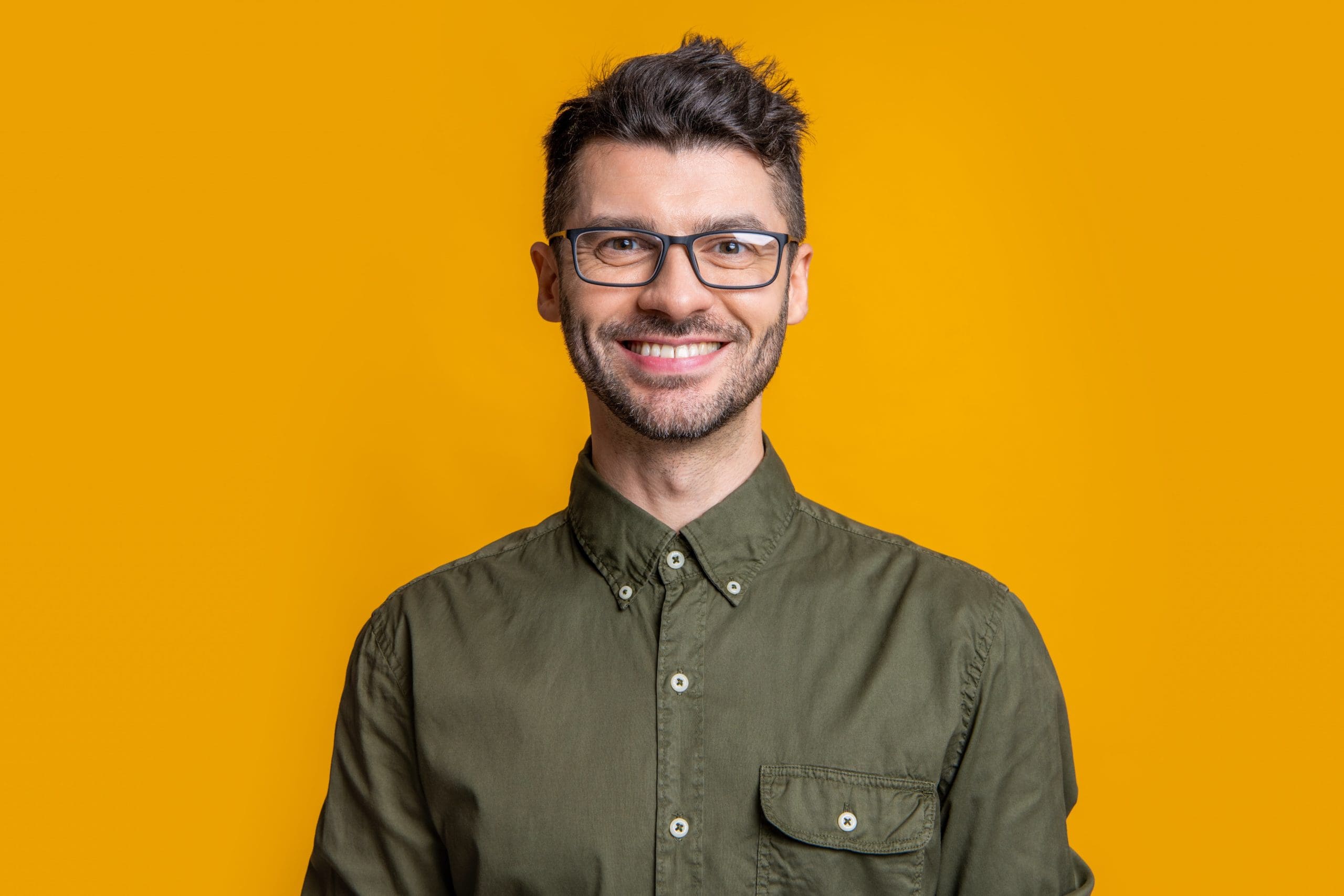 NHS Dental Extractions - Kensington Court Clinic - Young man smiling - Header Image