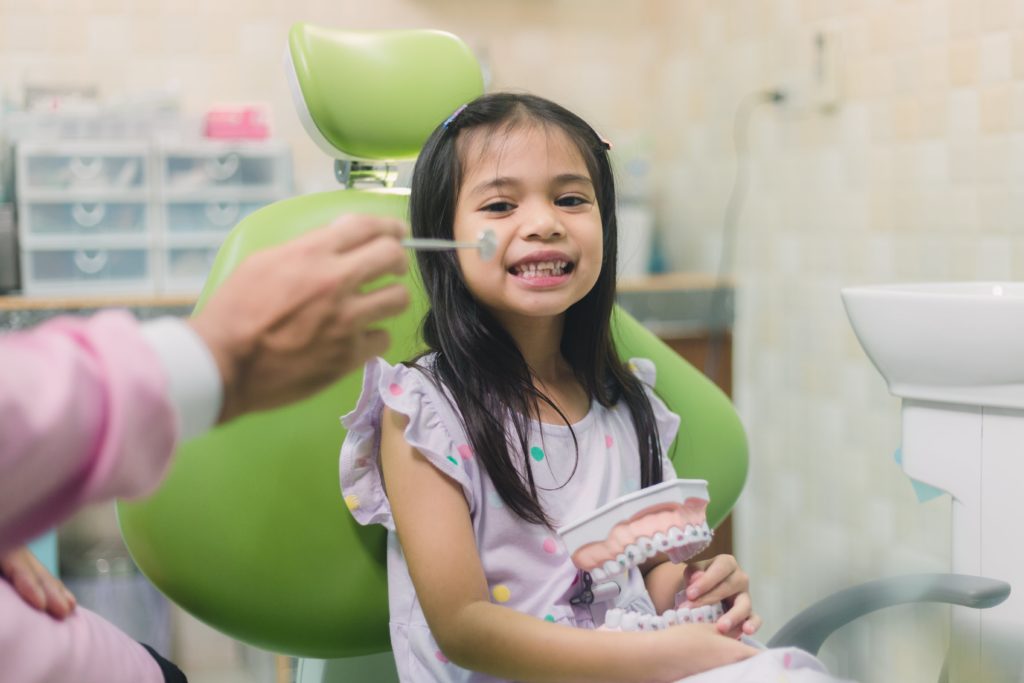 child dentistry - Kensington Court Clinic - Header Image - Happy child - top image